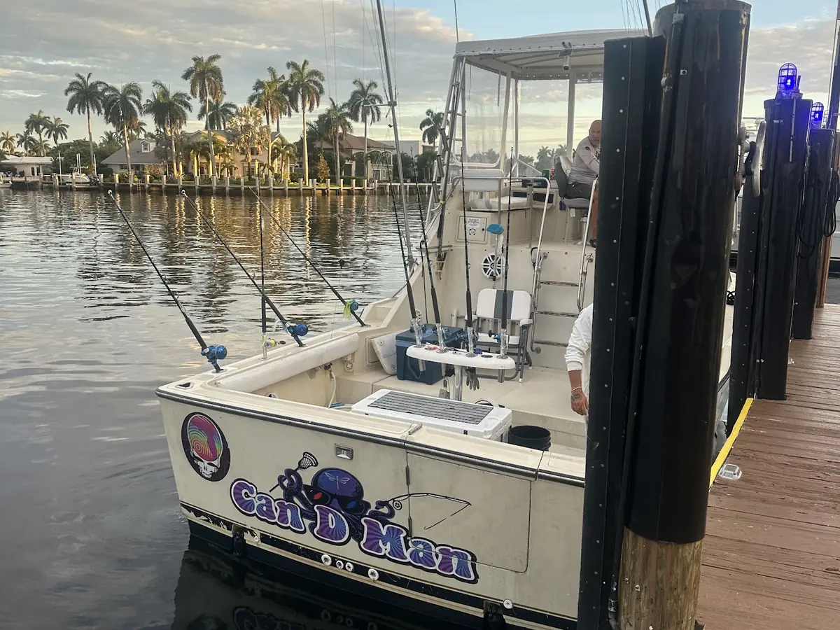 The Gradyful sportfishing boat tied up at the dock in Pompano Beach at dusk