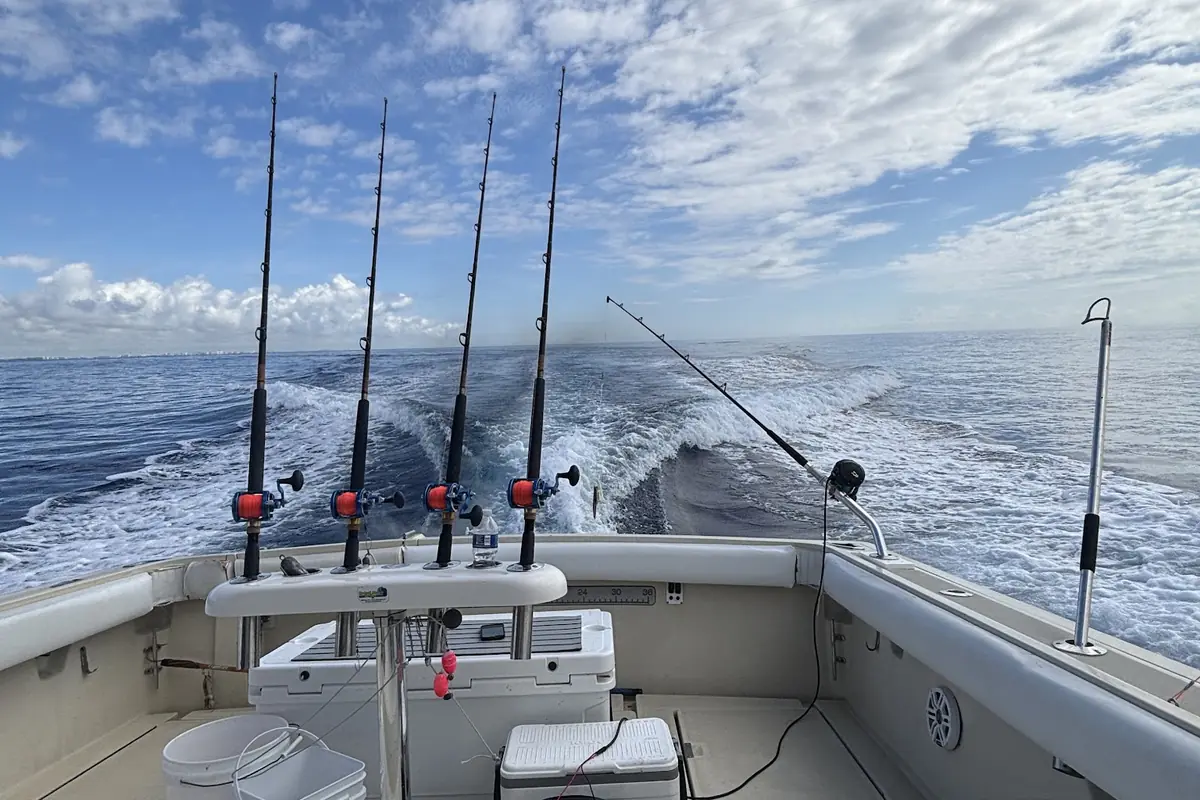 The trolling spread deployed under big clouds off Pompano Beach