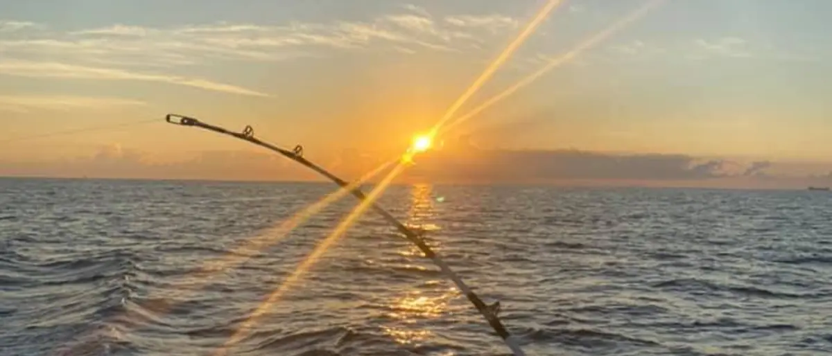 Sunrise over the wake as the boat runs offshore from Pompano Beach